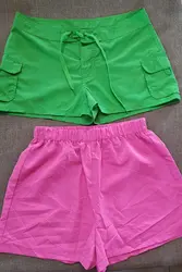 Dos Shorts verde y rosa