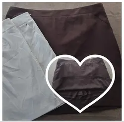 Dos polleras con short blanco y marrón